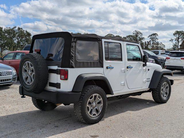 used 2015 Jeep Wrangler Unlimited car, priced at $19,455