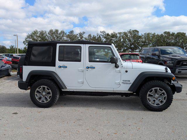 used 2015 Jeep Wrangler Unlimited car, priced at $19,455