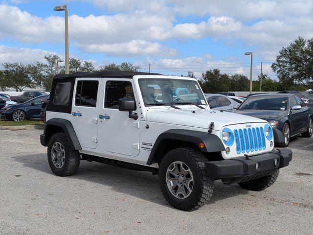 used 2015 Jeep Wrangler Unlimited car, priced at $19,455