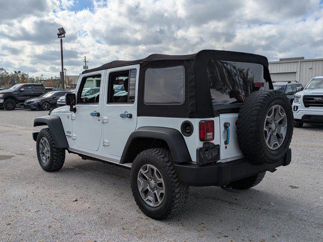 used 2015 Jeep Wrangler Unlimited car, priced at $19,455