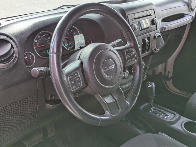 used 2015 Jeep Wrangler Unlimited car, priced at $19,455