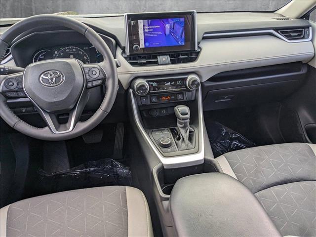 used 2023 Toyota RAV4 Hybrid car, priced at $27,596