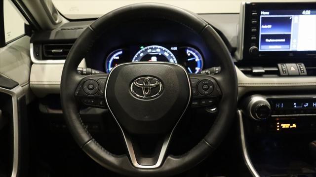 used 2021 Toyota RAV4 Hybrid car, priced at $32,188