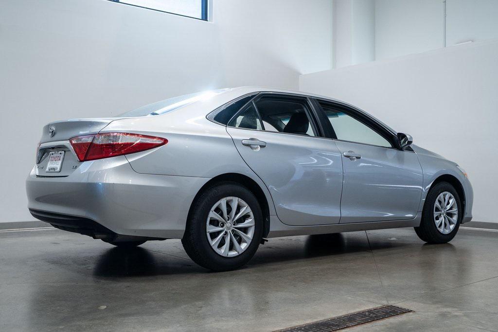 used 2015 Toyota Camry car, priced at $9,999
