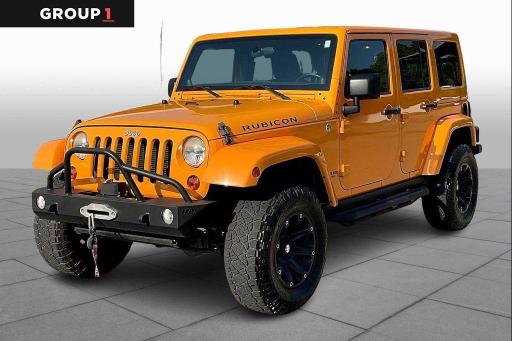used 2012 Jeep Wrangler Unlimited car, priced at $17,999