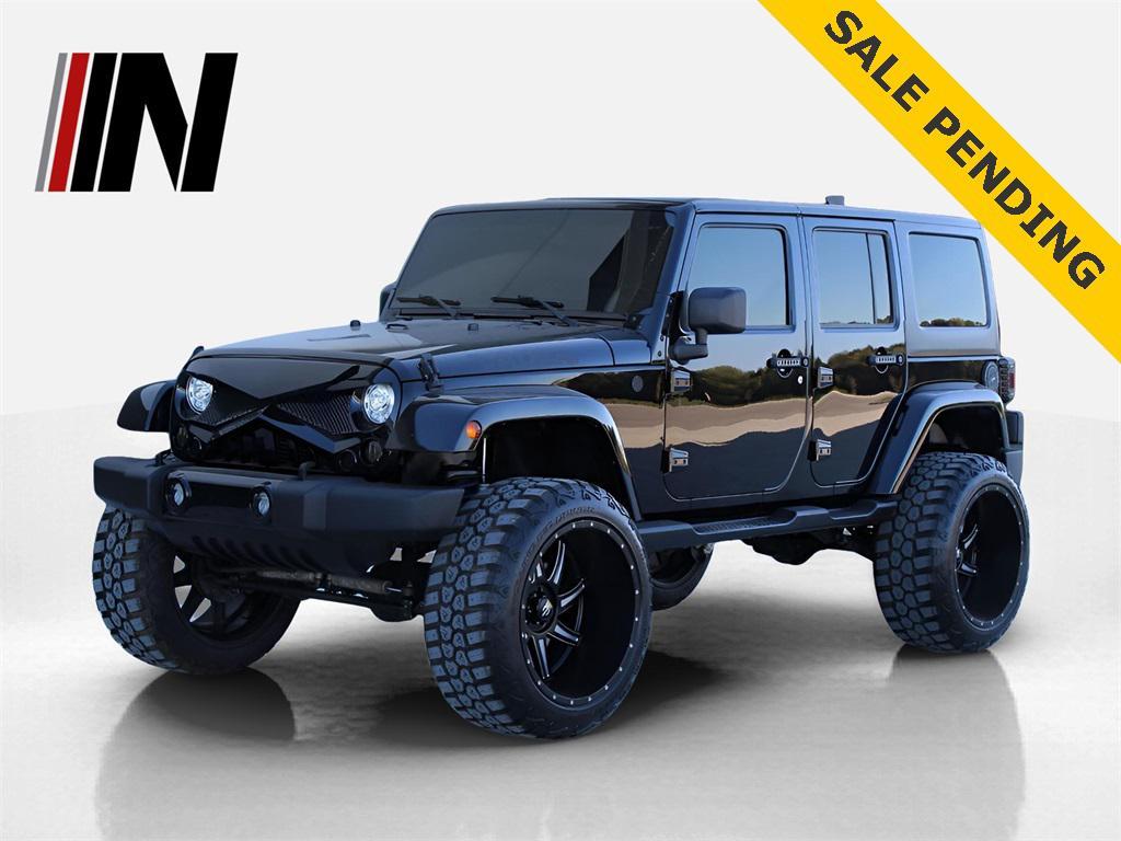 used 2017 Jeep Wrangler Unlimited car, priced at $18,981