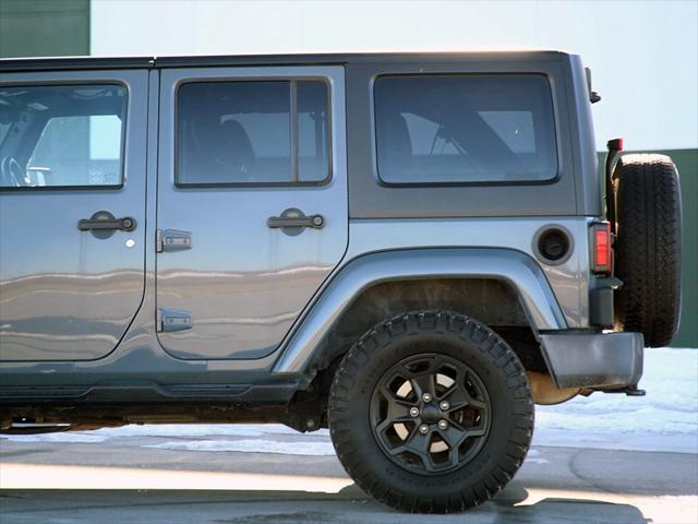 used 2015 Jeep Wrangler Unlimited car, priced at $19,799