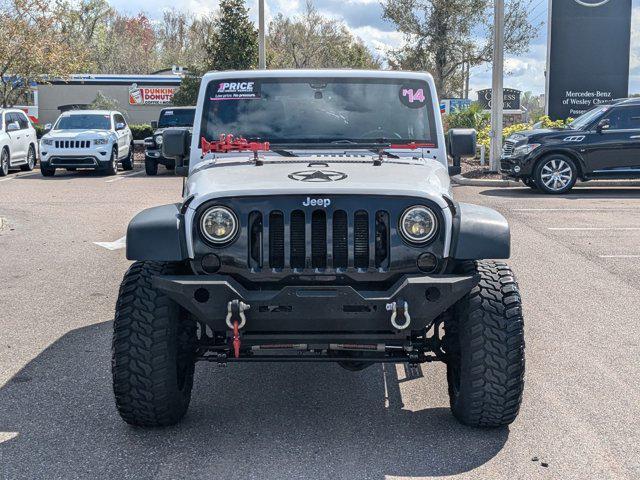 used 2014 Jeep Wrangler Unlimited car, priced at $21,377