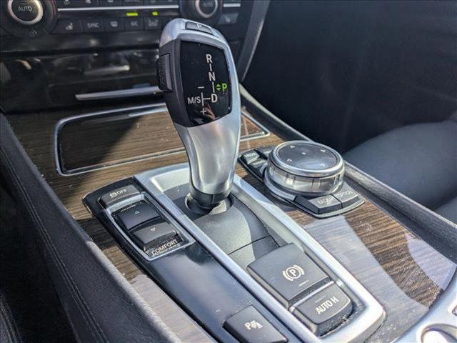 used 2015 BMW 740 car, priced at $16,589