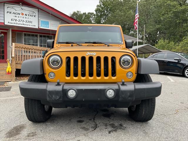 used 2014 Jeep Wrangler Unlimited car, priced at $14,985