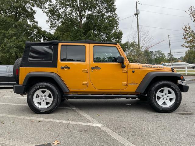 used 2014 Jeep Wrangler Unlimited car, priced at $14,985