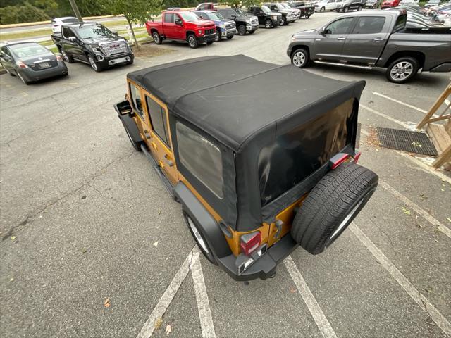 used 2014 Jeep Wrangler Unlimited car, priced at $14,985