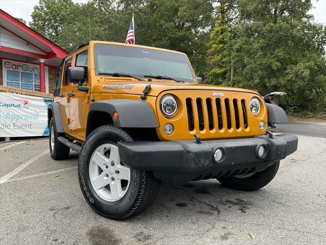 used 2014 Jeep Wrangler Unlimited car, priced at $14,985