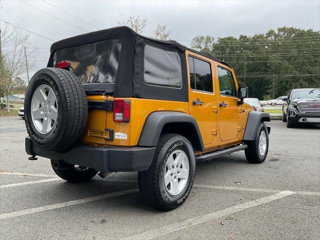 used 2014 Jeep Wrangler Unlimited car, priced at $14,985