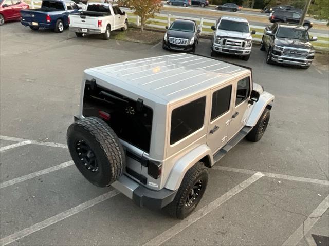 used 2012 Jeep Wrangler Unlimited car, priced at $15,985