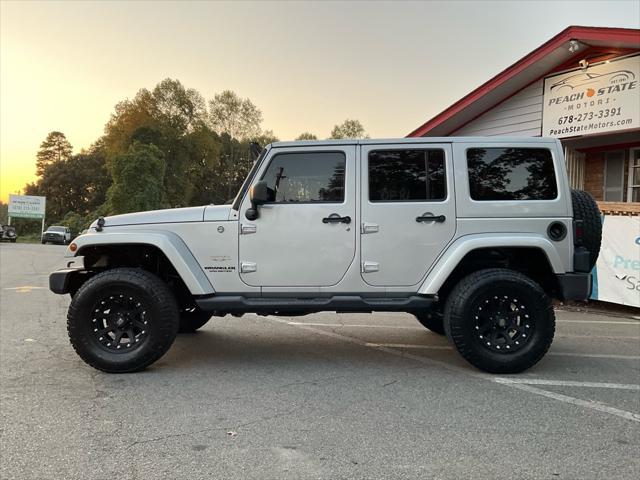 used 2012 Jeep Wrangler Unlimited car, priced at $15,985