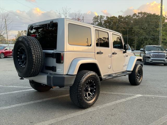 used 2012 Jeep Wrangler Unlimited car, priced at $15,985