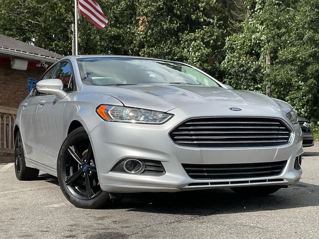 used 2016 Ford Fusion car, priced at $6,985