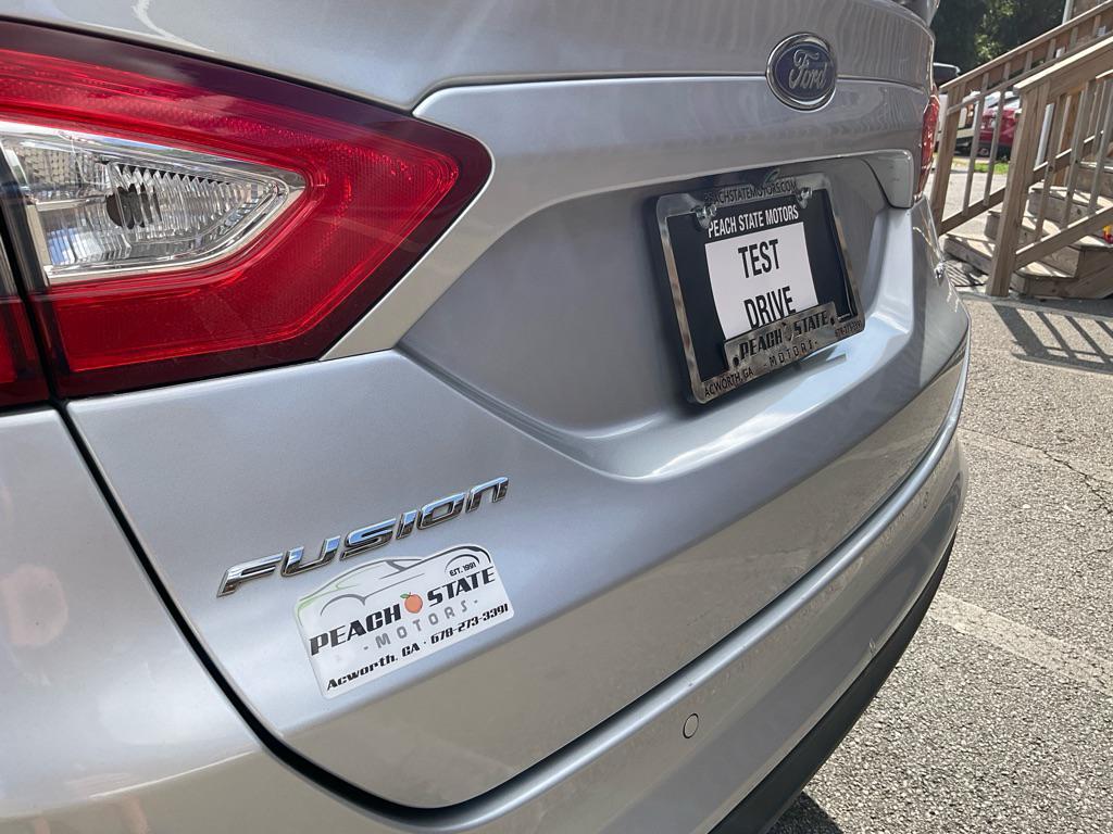 used 2016 Ford Fusion car, priced at $6,985