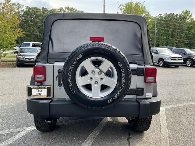 used 2014 Jeep Wrangler Unlimited car, priced at $13,985