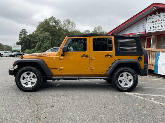 used 2014 Jeep Wrangler Unlimited car, priced at $12,485