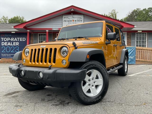 used 2014 Jeep Wrangler Unlimited car, priced at $12,485