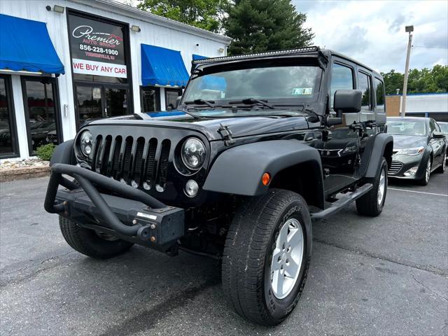 used 2014 Jeep Wrangler Unlimited car, priced at $15,995