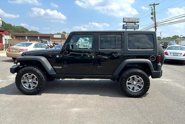 used 2014 Jeep Wrangler Unlimited car, priced at $19,695
