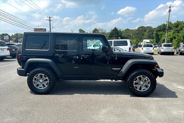 used 2014 Jeep Wrangler Unlimited car, priced at $16,995