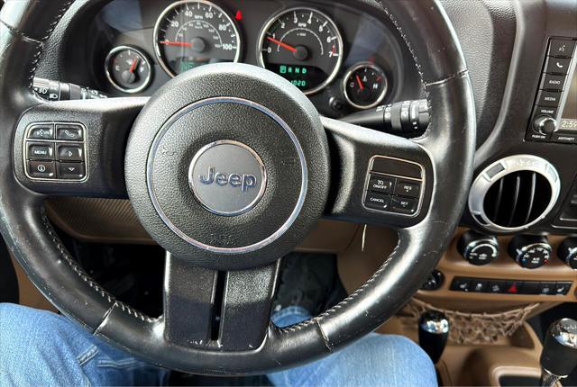 used 2014 Jeep Wrangler Unlimited car, priced at $17,995