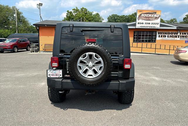 used 2014 Jeep Wrangler Unlimited car, priced at $19,695