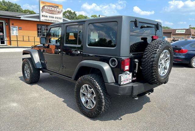 used 2014 Jeep Wrangler Unlimited car, priced at $16,995