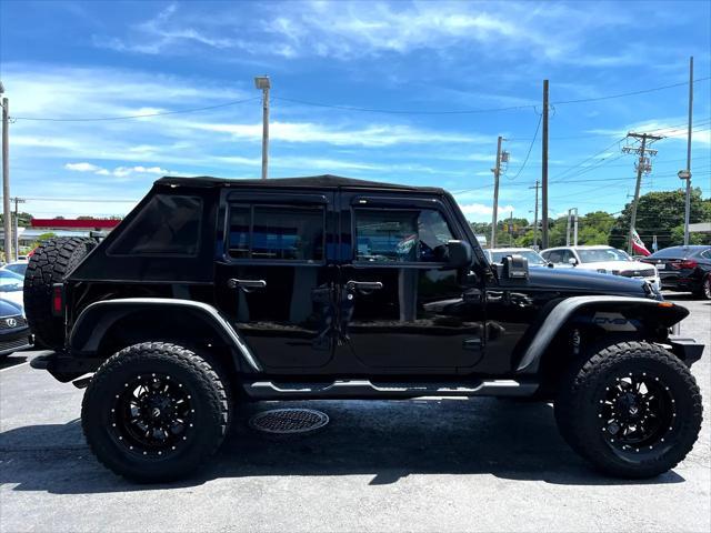 used 2011 Jeep Wrangler Unlimited car, priced at $12,995