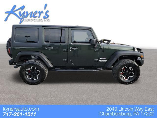 used 2011 Jeep Wrangler Unlimited car, priced at $16,995