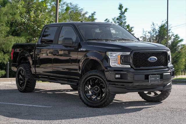 used 2018 Ford F-150 car, priced at $25,451