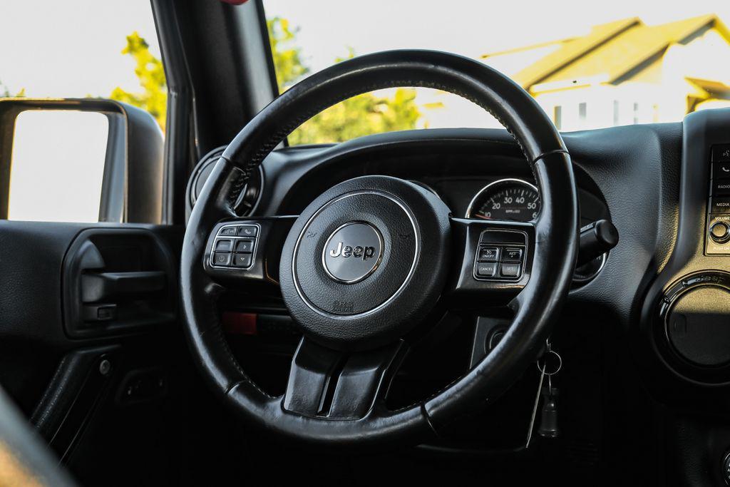 used 2017 Jeep Wrangler Unlimited car, priced at $27,287