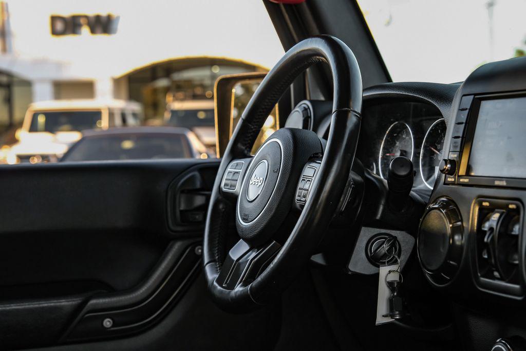 used 2017 Jeep Wrangler Unlimited car, priced at $27,287