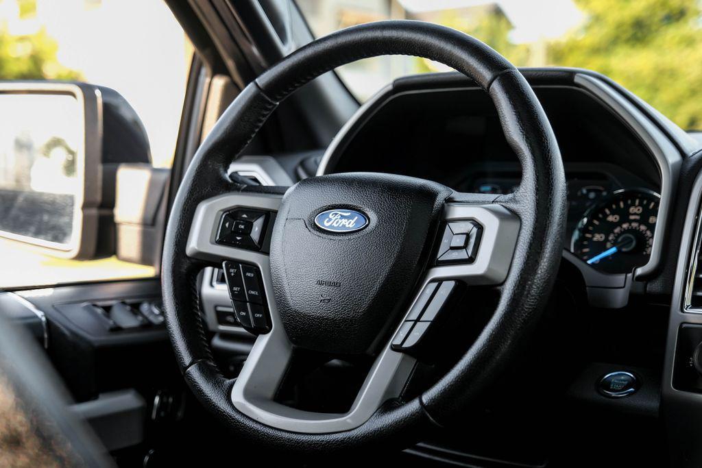 used 2015 Ford F-150 car, priced at $15,106