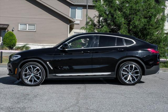 used 2021 BMW X4 car, priced at $31,303