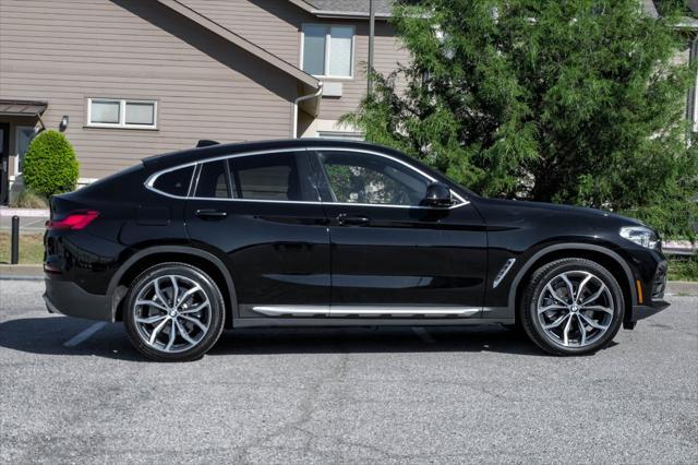 used 2021 BMW X4 car, priced at $31,303