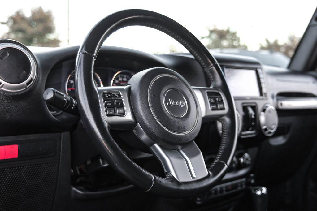 used 2016 Jeep Wrangler Unlimited car, priced at $25,760