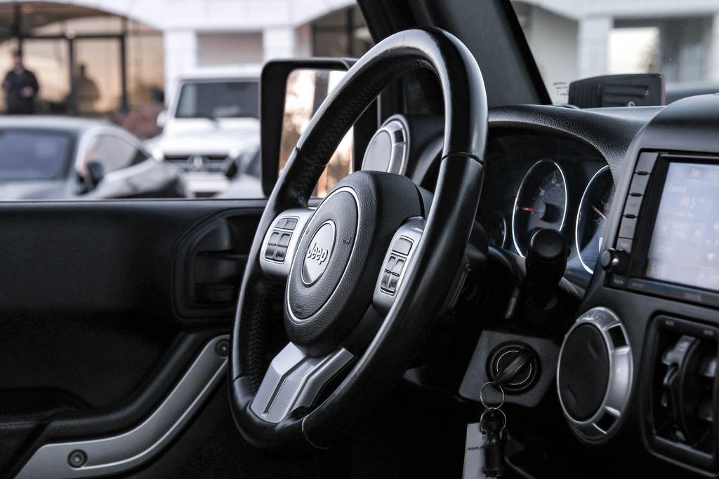 used 2016 Jeep Wrangler Unlimited car, priced at $25,760