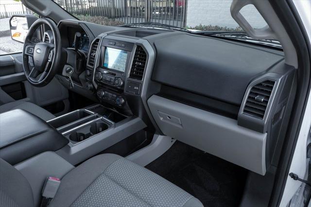 used 2018 Ford F-150 car, priced at $25,555