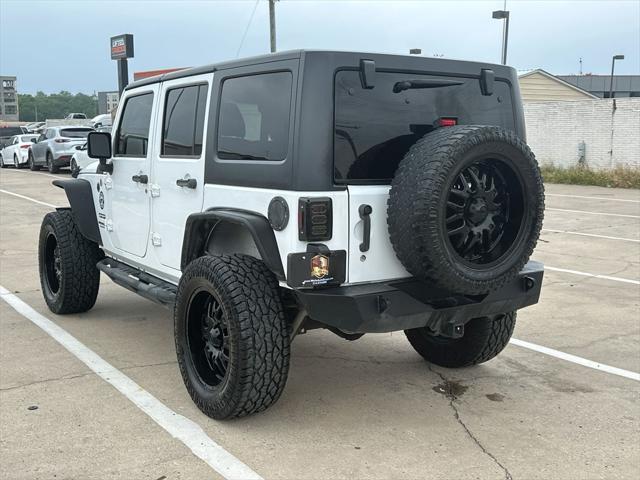 used 2015 Jeep Wrangler Unlimited car, priced at $19,994