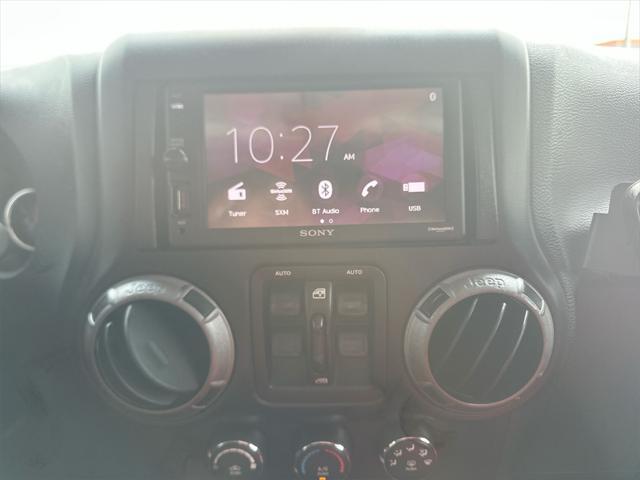 used 2015 Jeep Wrangler Unlimited car, priced at $19,994