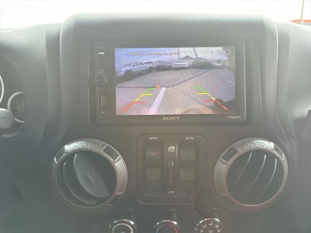 used 2015 Jeep Wrangler Unlimited car, priced at $19,994