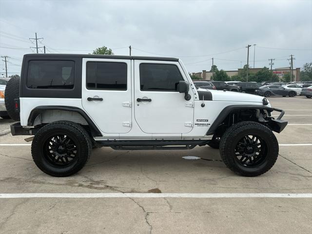 used 2015 Jeep Wrangler Unlimited car, priced at $19,994