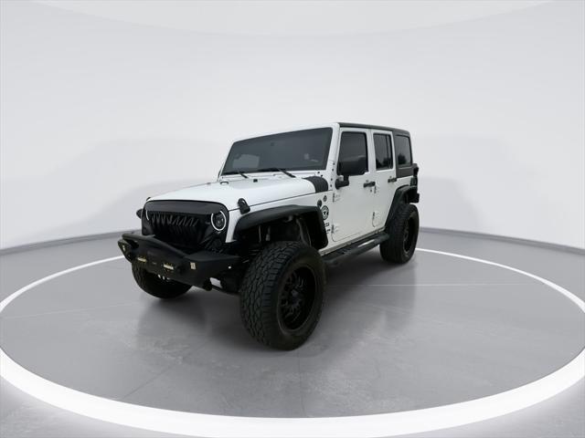 used 2015 Jeep Wrangler Unlimited car, priced at $19,994