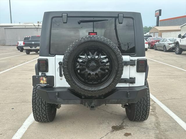 used 2015 Jeep Wrangler Unlimited car, priced at $19,994
