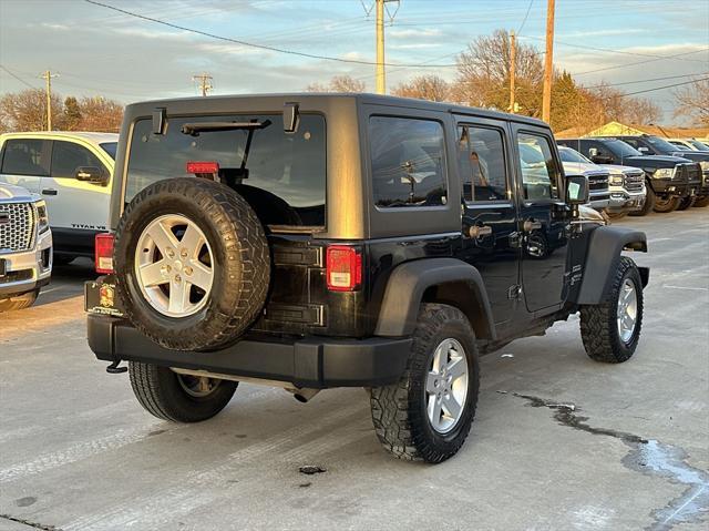 used 2015 Jeep Wrangler Unlimited car, priced at $15,899